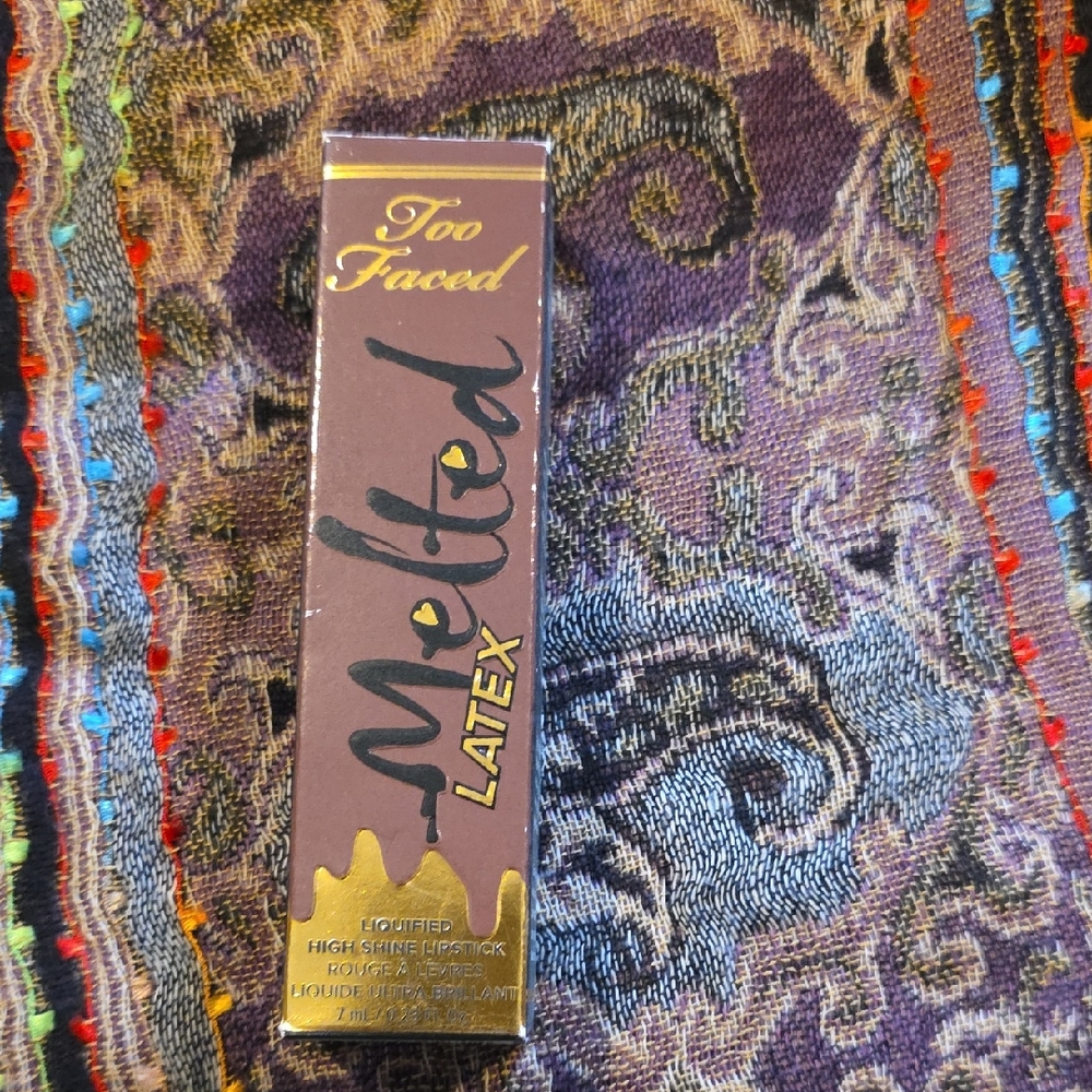 Too Faced Melted Latex Lip Gloss in Strange Love